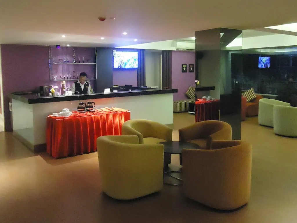 Spacious Super Deluxe Room with elegant styling, large windows, and a plush double bed